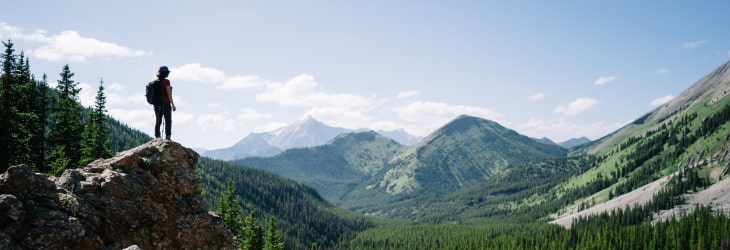 hiker staring at inspirational landscape