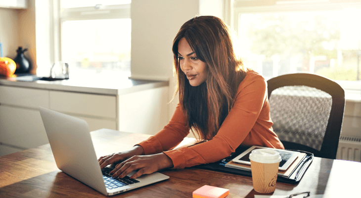 woman-on-laptop-checks-her-account-balances